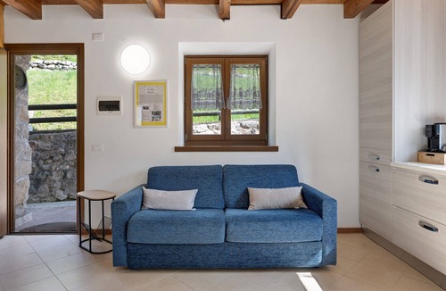 Folgaria House | Ca della Melania Stone House with Garden, Pool, and Barbecue
