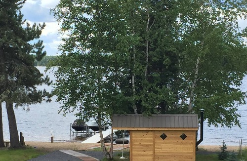 Shebandowan Cottage | Modern Cozy Apartment located on one of the most pristine Sandy beaches on Lake