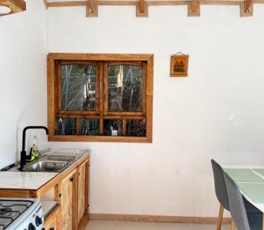 Puqueldon House | Cabaña entre arrayanes de Detif