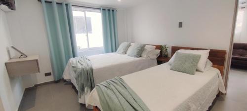 Punta Hansa Hotel | Cabañas Green Yard