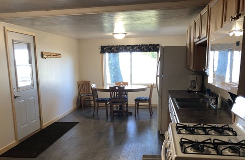 Hines Resort | Cabin 1 Lakefront Screen Patio Beach Dock Resort Amenities Resort Amenities Fish