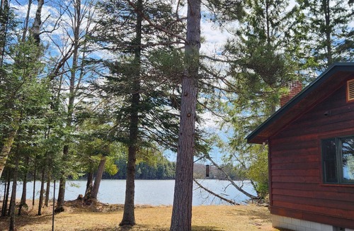 Presque Isle Cabin | Cabin with private peninsula on Presque Isle Chain of Lakes!