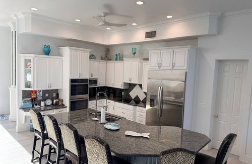 Sandy Point House | Calm Waters – Private 6BR Beachfront Villa w/Pool & Rooftop View - North Caicos