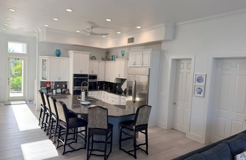 Sandy Point House | Calm Waters – Private 6BR Beachfront Villa w/Pool & Rooftop View - North Caicos