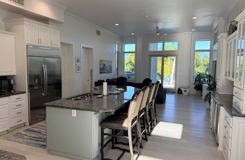 Sandy Point House | Calm Waters – Private 6BR Beachfront Villa w/Pool & Rooftop View - North Caicos