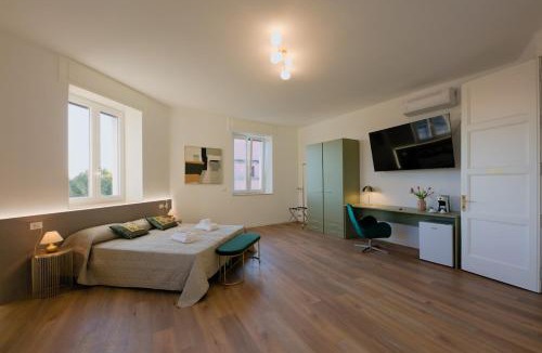 Udine Apartment | Camera Berlino - La Casa di Carta Affittacamere