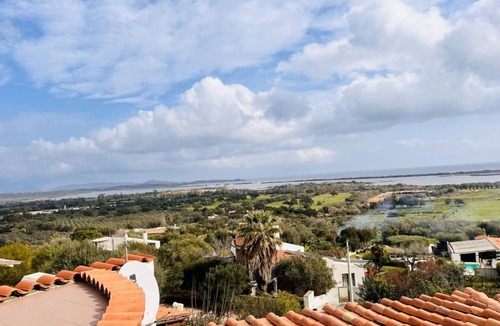 San Teodoro House | Camera Nettuno - Villa Flores