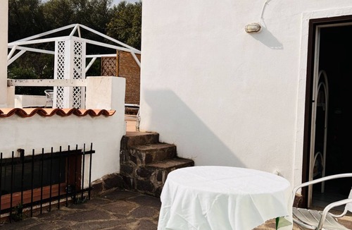 San Teodoro House | Camera Nettuno - Villa Flores
