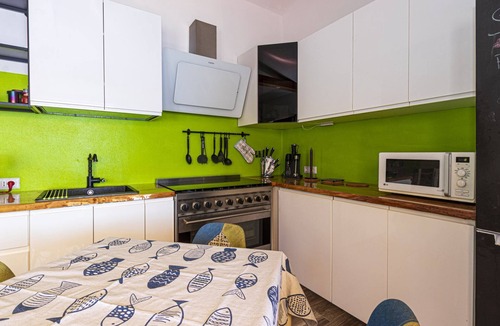 Seccheto Apartment | Camilla, a two-room apartment in Seccheto with a splendid sea view, a small balcony equipped with ch