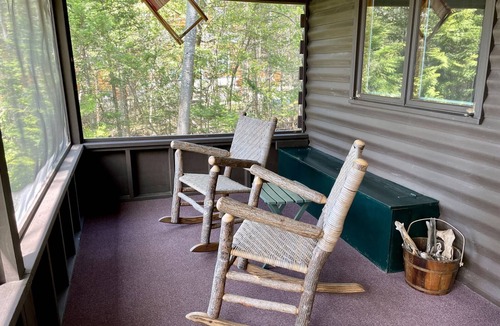 Rangeley Plantation House | Camp Chuck-a-luck | Private Beach, Dock, Kayaks | Dog-Friendly Mooselookmeguntic Lake Cabin