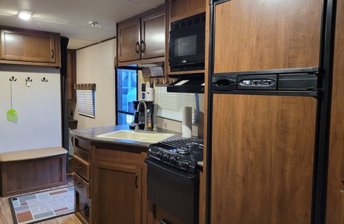 La Pointe RV Rental | Camp in style with AC/heat, WIFI, on Main Street, 1 block from Joni's beach