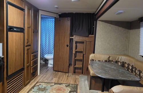 La Pointe RV Rental | Camp in style with AC/heat, WIFI, on Main Street, 1 block from Joni's beach