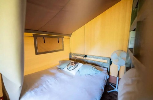 Target RV Rental | Camping maeva Escapades Domaine des Grandes Côtes * - 2-Room Safari Lodge Tent for 4 People (2 adults + 2 children under 12 years old)