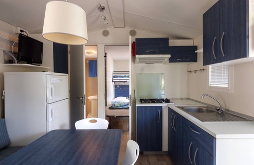 Fertilia House | Camping Village Laguna Blu by Interhome