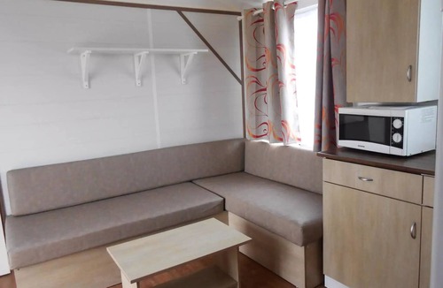 Binic House | Campsite LE PANORAMIC * - MOBILE HOME SUPER FAMILY 2 36M2 with semi covered wood terrace 6 people