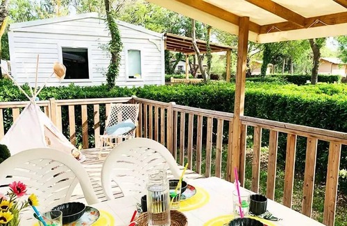 Mirepeisset House | Campsite Le Val de Cesse * - Mobile home WELCOME 27m2 - 2 bedrooms - TV - air conditioning - terrace - 4 people