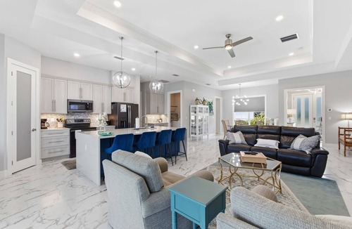 Palm Harbor House | Canal-front Home With Pool Dock Water Fun