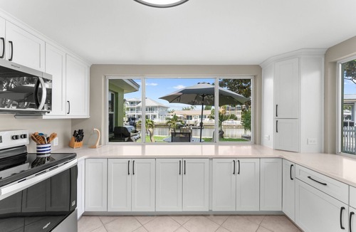 Baywood Village House | Canal Front Paradise with Serene Waterfront Setting, Bonus Room