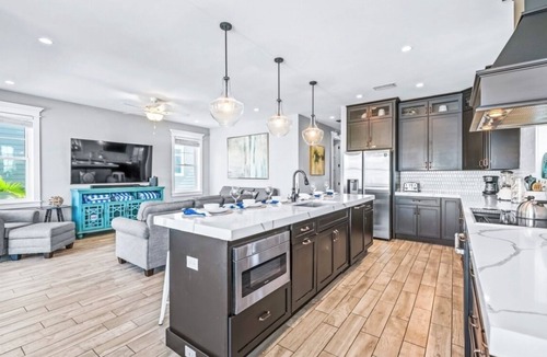 Bradenton Beach House | Canal Front! Putt putt, paddle boards,kayaks, heated pool and spa!