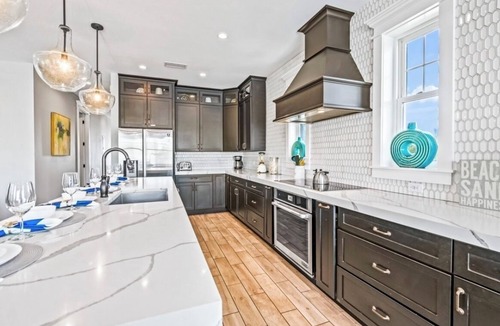 Bradenton Beach House | Canal Front! Putt putt, paddle boards,kayaks, heated pool and spa!