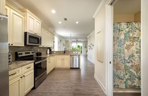 Marathon Villa | Canal Front with Dock, Private Pool, Huge Tiki Hut w/TV, Bikes, Paddleboards!