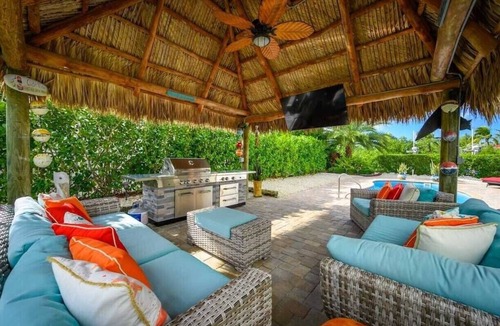 Marathon Villa | Canal Front with Dock, Private Pool, Huge Tiki Hut w/TV, Bikes, Paddleboards!