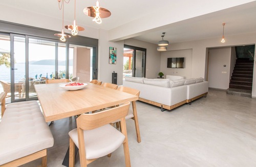 Evgiros Villa | Cape villa, be blown away by breathtaking waterfront luxury villa!