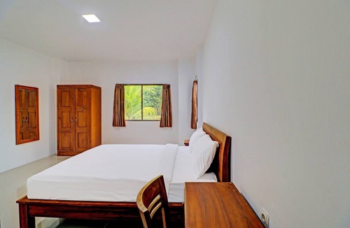 By Pass Ngurah Rai Hotel | Capital O 92039 Runways House