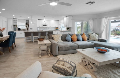 Isles of Capri House | CAPRI PARADISE! Beautiful waterfront home. Solar heated pool, 130ft dock.