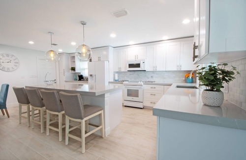Isles of Capri House | CAPRI PARADISE! Beautiful waterfront home. Solar heated pool, 130ft dock.