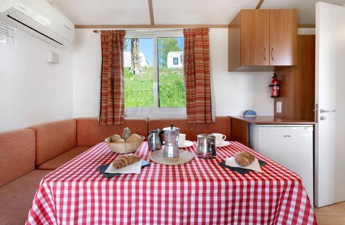 Pettenasco RV Rental | Caravan 'Mobile Home Comfort Standard' with Lake View, Shared Pool and Wi-Fi