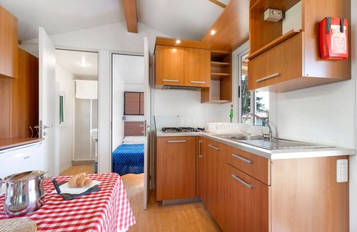 Pettenasco RV Rental | Caravan 'Mobile Home Comfort Standard' with Lake View, Shared Pool and Wi-Fi