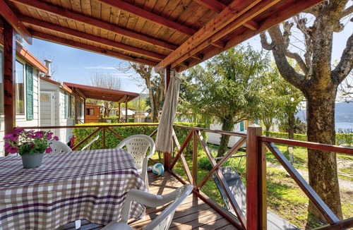 Pettenasco RV Rental | Caravan 'Mobile Home Comfort Standard' with Lake View, Shared Pool and Wi-Fi