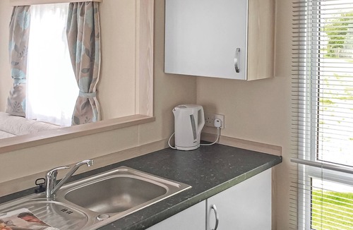 Chapel Saint Leonards House | Caravan with one double and one twin.