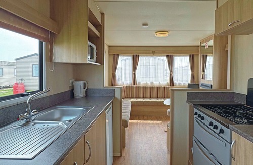 Chapel Saint Leonards House | Caravan with one double and one twin.
