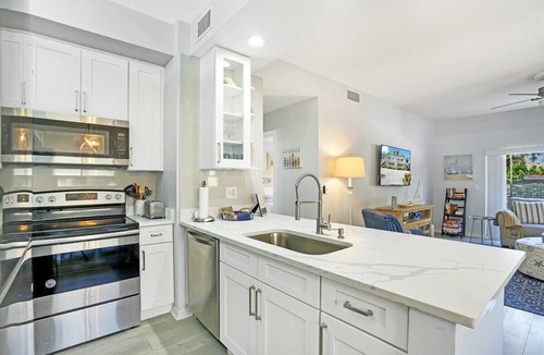 Bella Vista Condo | Carlin Park Villa,Pool,Pets OK-Walk to the Beach!