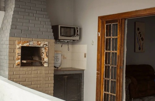 Jardim Tres Marias House | Casa Aconchegante Perto da Praia Para Família com Rede, Churrasqueira e Varanda