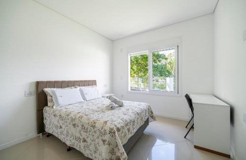 Sambaqui House | Casa Cerutti 3Q com vista para o mar by Achei