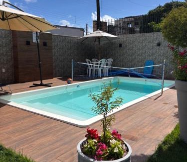Jardim Iate Clube House | Casa com piscina Aquecida Balneário Camboriú CasaAlbertiBc