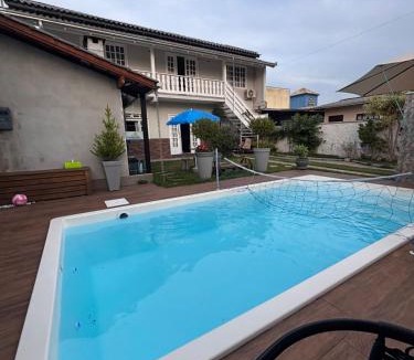 Jardim Iate Clube House | Casa com piscina Aquecida Balneário Camboriú CasaAlbertiBc