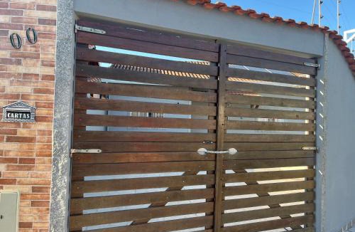Santa Terezinha House | Casa com piscina climatizada em Itanhaém!