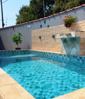 Santa Terezinha House | Casa com piscina climatizada em Itanhaém!