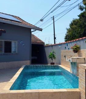 Santa Terezinha House | Casa com piscina climatizada em Itanhaém!