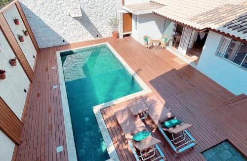Santinho House | Casa com piscina em frente à Praia do Santinho