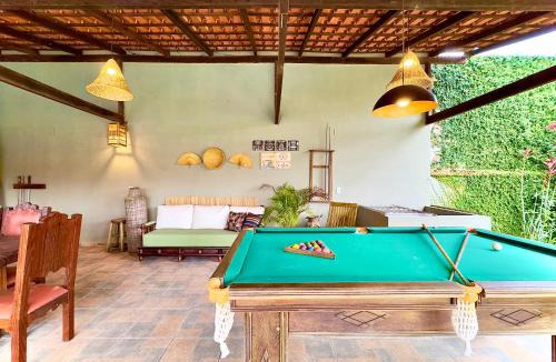 Itacolomi House | Casa Completa com Piscina Churrasqueira Sinuca Wi-Fi e Garagem para 3 Carros a 500m da Praia Acomoda 12 Pessoas, 5 Quartos e Ar Condicionado