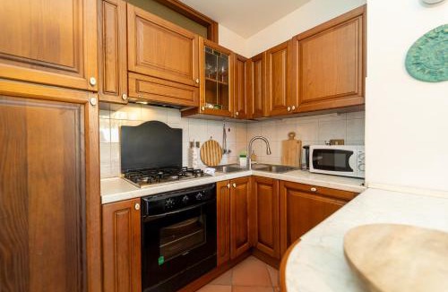 Sala Comacina Apartment | Casa con parcheggio, piscina giardino, barbecue
