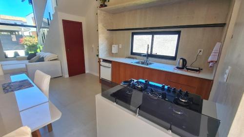 Capivari House | Casa de luxo com 4 Suites Praia dos Ingleses, SC