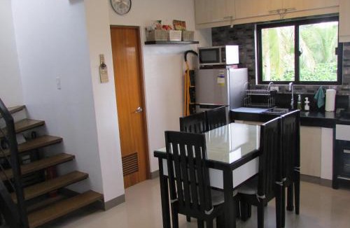 Tagaytay Apartment | Casa Devino - Spacious 76 SQM 2BR Loft Retreat in Tagaytay - Pool - Free WIFI NETFLIX PARKING PET Stay - located on 3rd Floor