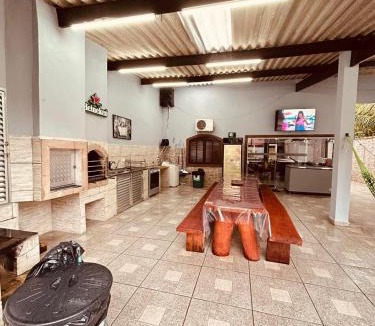 Caiubura House | Casa em Bertioga com piscina aquecida Sitio família ROCHA