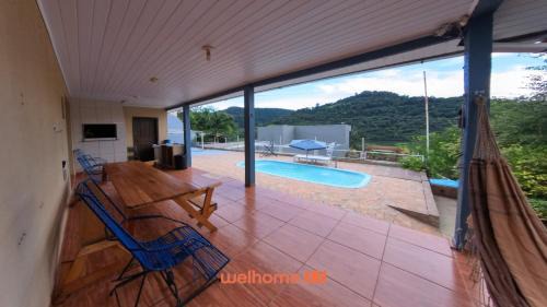 Santos Dumont House | Casa em Chapeco com Piscina e Vista da Montanha